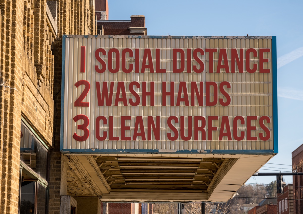 Movie cinema billboard with three basic rules to avoid the coronavirus or Covid-19 epidemic of wash hands, maintain social distance and clean surfaces